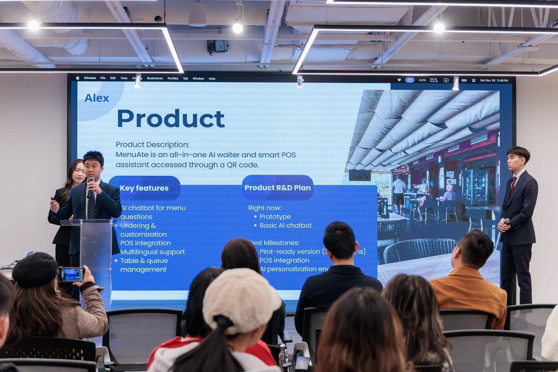 Students presenting research findings to an audience