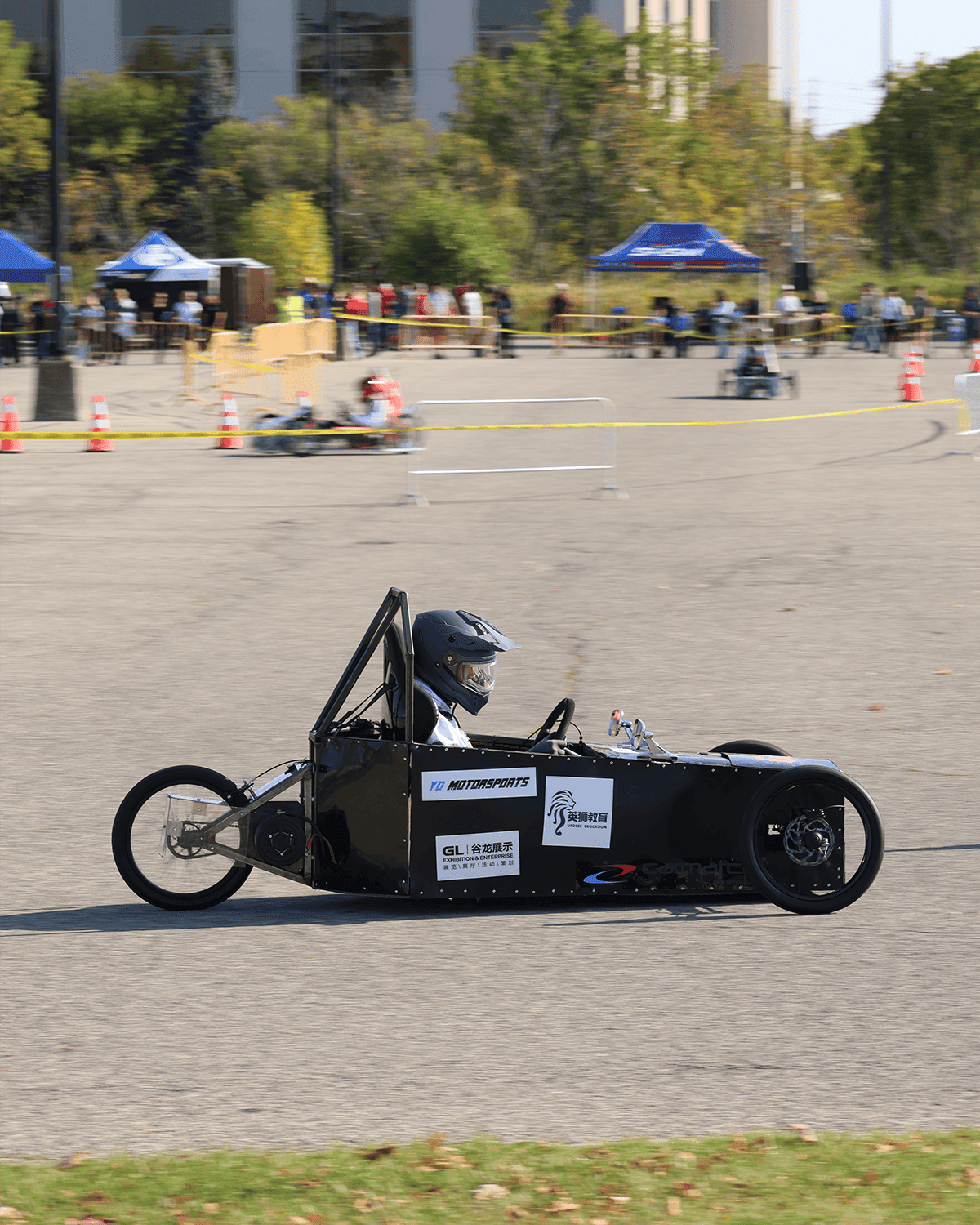 Students collaborating during an EV build session