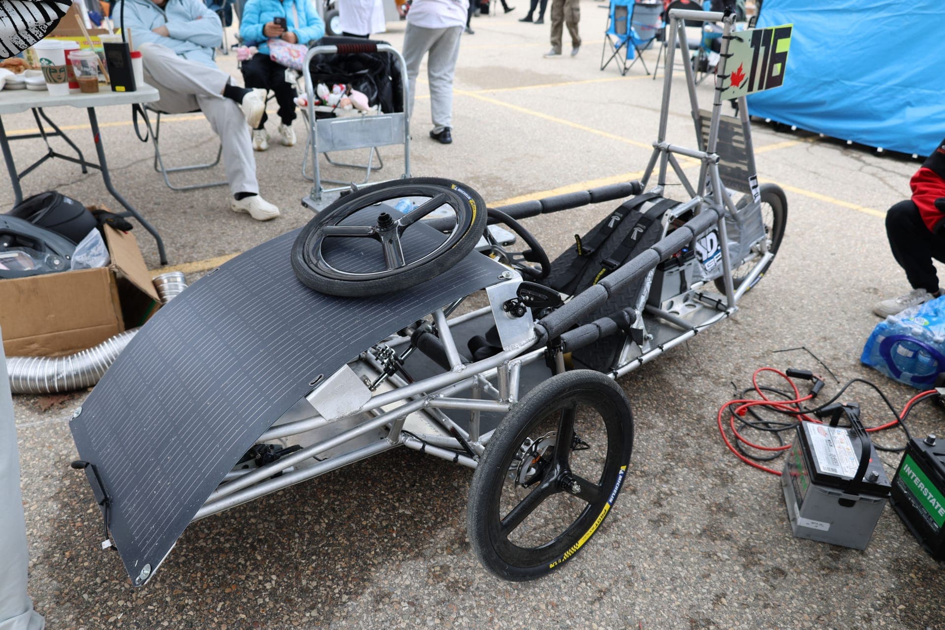Completed EV with solar panel in the pit area at Waterloo